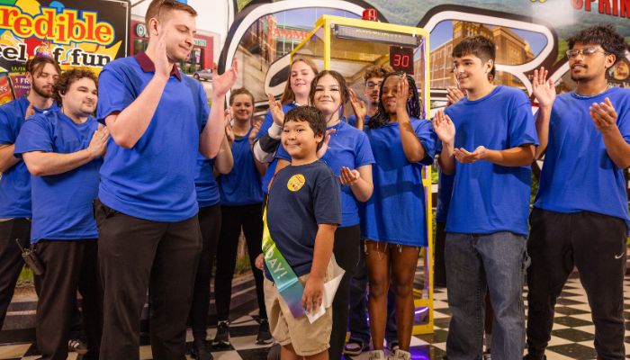 Team sings to the birthday kid during our kids birthday parties