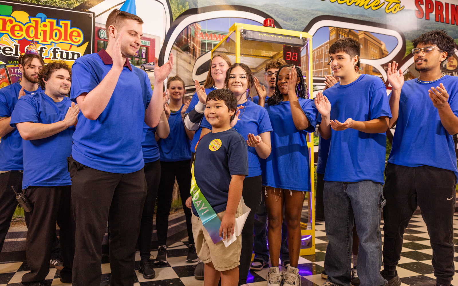 Team members celebrating with guests