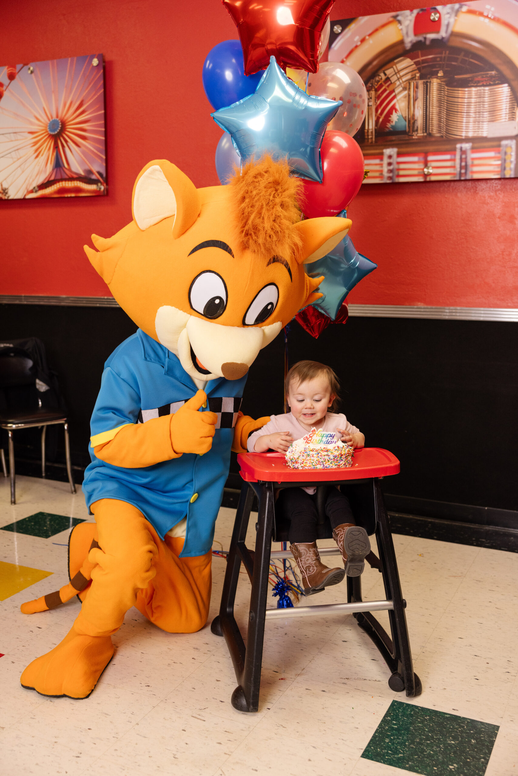Birthday celebration with kids smiling at table