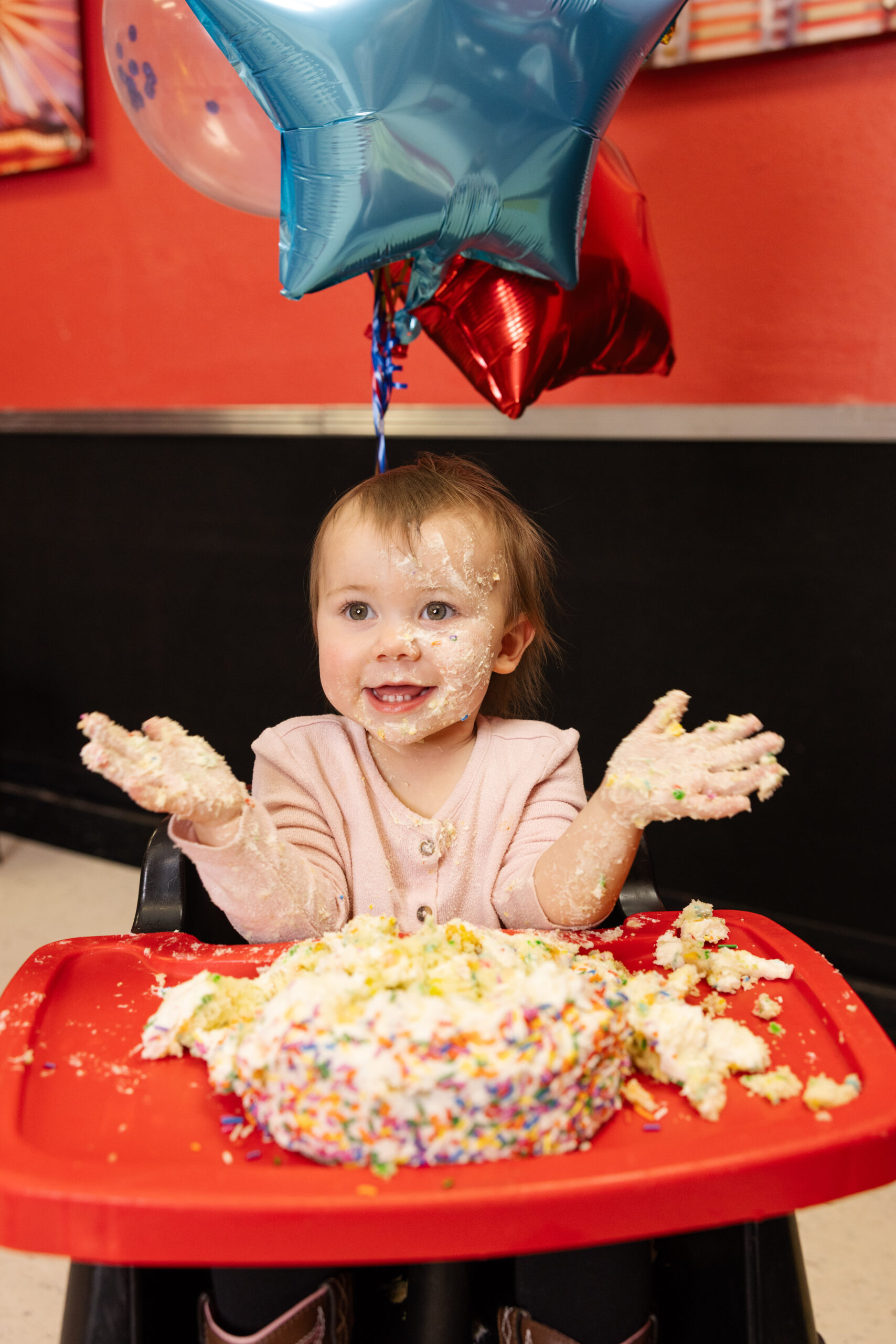 Smiling child showing how easy it is to complete a waiver before visiting
